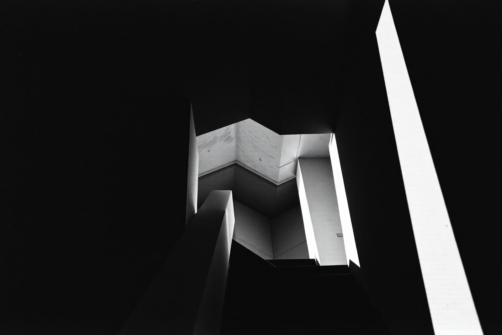 Brutalist stair core in high contrast black and white