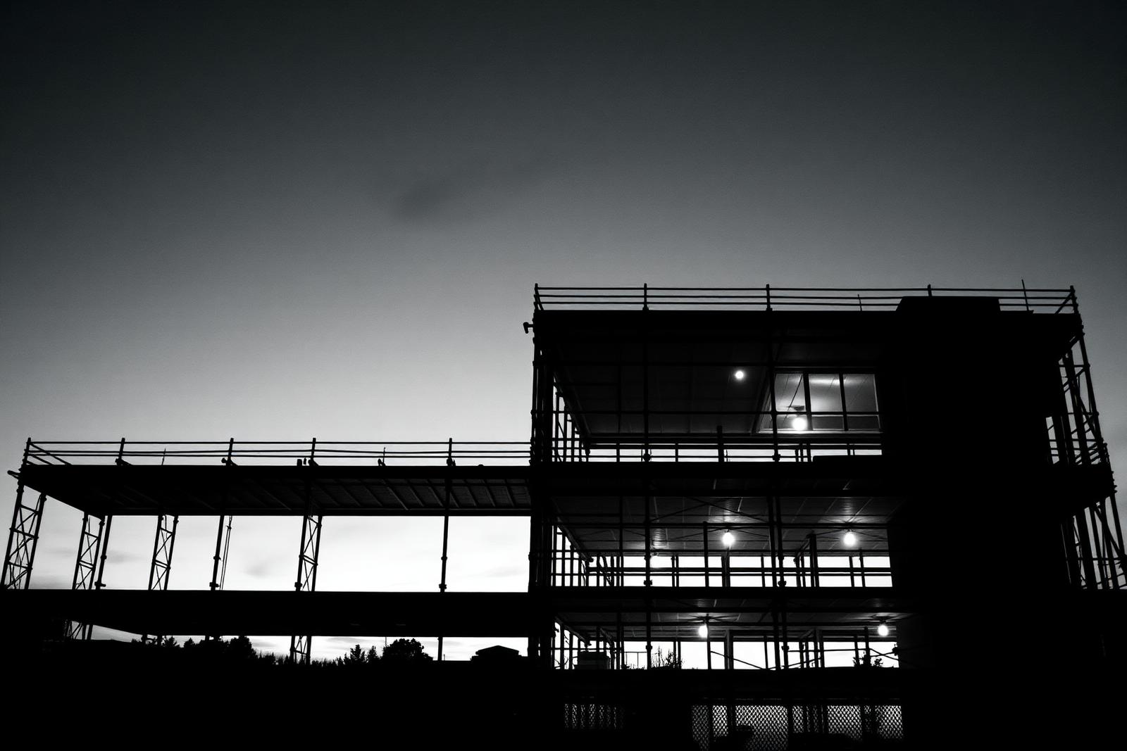 Concrete structure under construction, hard light, black and white