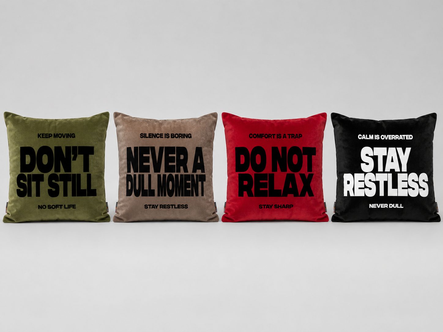 Restless Bastards statement cushions — DON'T SIT STILL, NEVER A DULL MOMENT, DO NOT RELAX, STAY RESTLESS